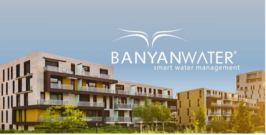 Modern apartment complex with the Banyan Water logo and tagline 'smart water management’.